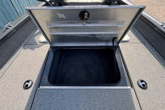 Slide: The Image of Open storage compartment on 2019 Tracker Pro Team 175 TF boat deck. - 12