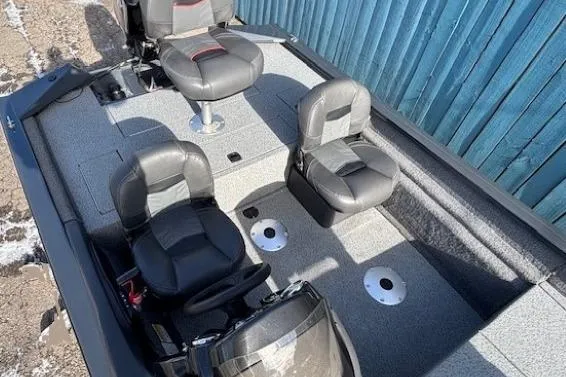 Slide: The Image of 2019 Tracker Pro Team 175 TF boat interior with seating and steering wheel. - 14