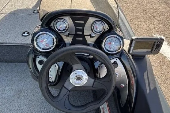 Slide: The Image of 2019 Tracker Pro Team 175 TF dashboard with steering wheel and gauges. - 19
