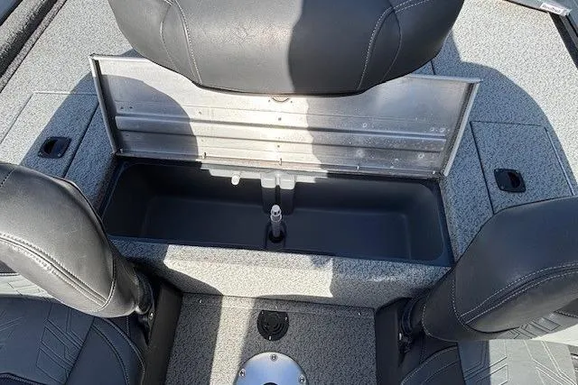 Slide: The Image of 2019 Tracker Pro Team 175 TF boat interior with storage compartment and seating. - 22