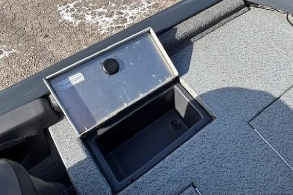 Slide: The Image of 2019 Tracker Pro Team 175 TF boat storage compartment with open lid. - 23