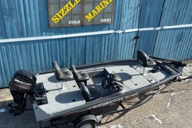 Slide: The Image of 2019 Tracker Pro Team 175 TF boat with Mercury engine, parked outside Sizzle Marine, Ohio. - 5