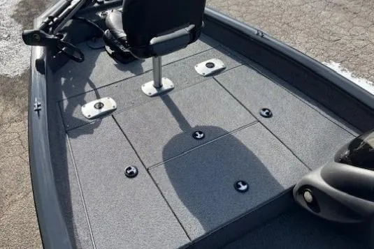 Slide: The Image of 2019 Tracker Pro Team 175 TF boat deck with seating and storage compartments. - 7