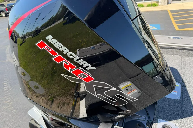 Slide: The Image of 2026 Lund 1875 Pro-V boat with Mercury Pro XS engine, close-up view. - 31