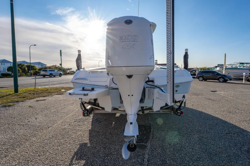 Slide: The Image of 2017 Crevalle 26 Open boat with Yamaha 300 engine in sunny parking lot. - 12