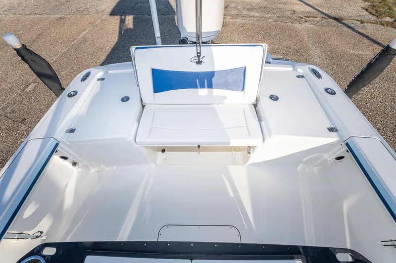 Slide: The Image of 2017 Crevalle 26 Open boat interior with seating and storage compartments. - 31