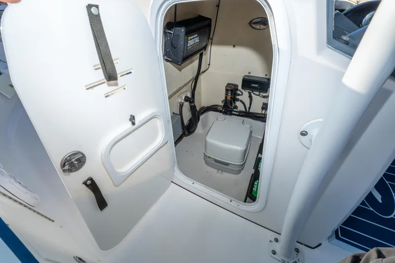 Slide: The Image of 2017 Crevalle 26 Open boat interior with storage compartment and equipment. - 38