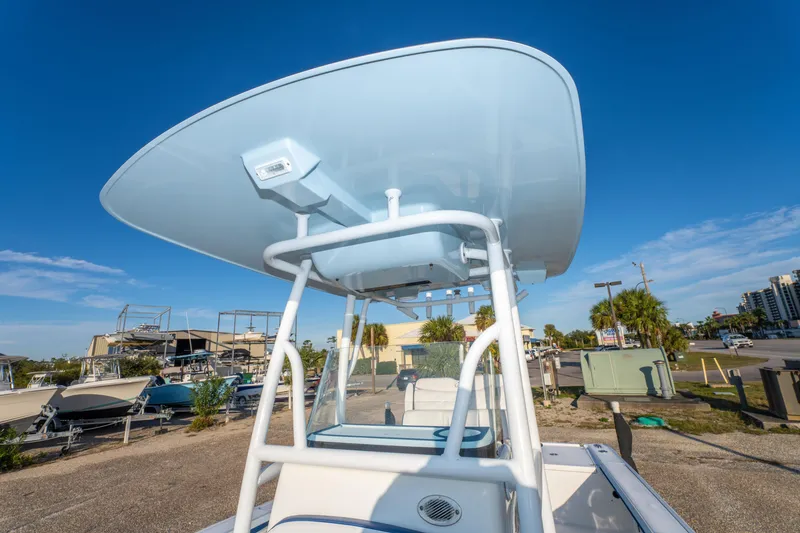 Slide: The Image of 2017 Crevalle 26 Open boat with T-top under clear blue sky. - 39