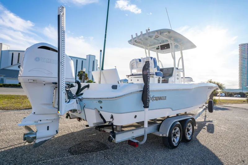 Slide: The Image of 2017 Crevalle 26 Open boat on trailer, featuring Yamaha engine, parked outdoors. - 4