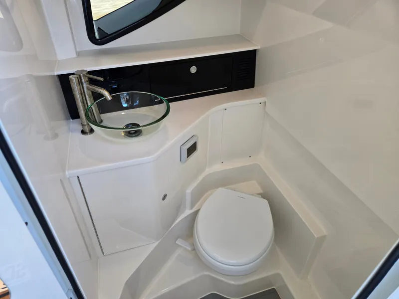 Slide: The Image of Modern bathroom with glass sink and toilet in a boat. - 20
