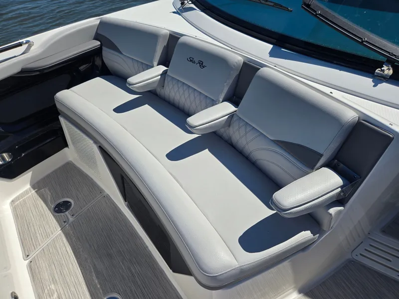 Slide: The Image of The 2027 Sea Ray SLX 360 Outboard features an elegant, cushioned bench seat with armrests. - 22