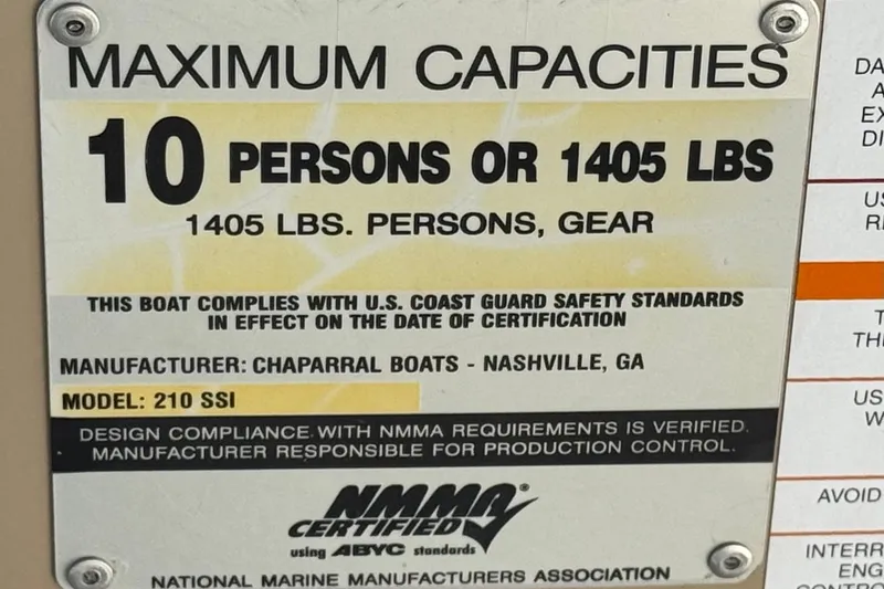 Slide: The Image of Capacity label for 2005 Chaparral 210 SSi boat, maximum 10 persons or 1405 lbs. - 36