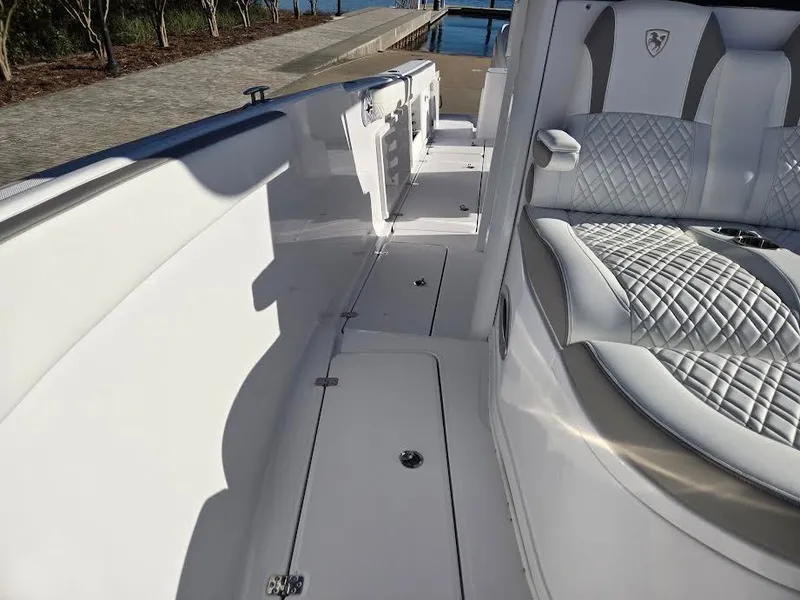 Slide: The Image of Interior of a 2024 Century 3200 boat with luxurious seating. - 16