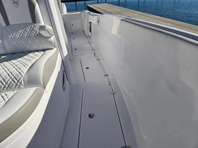 Slide: The Image of 2024 Century 3200 boat interior with quilted seating. - 17