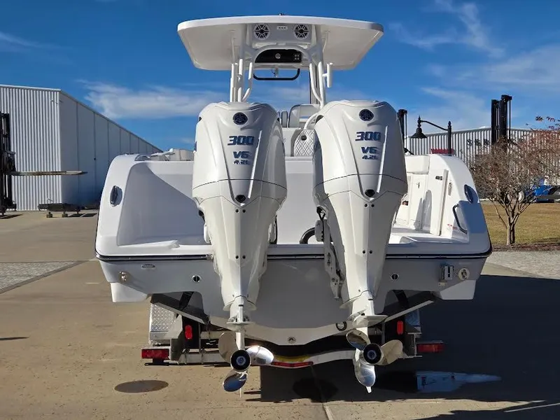 Slide: The Image of 2024 Century 3200 boat with dual outboard engines. - 2
