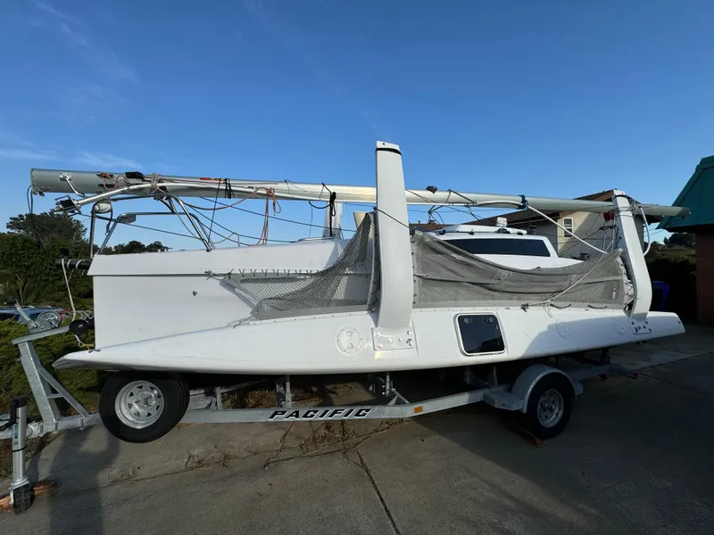 The Image of 2023 Corsair 760 sailboat on trailer, ready for transport. - 0