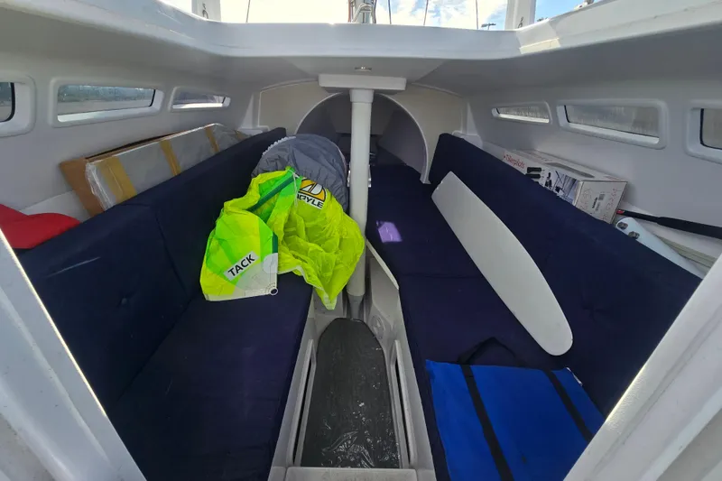 Slide: The Image of 2023 Corsair 760 boat detail with sleek design and outdoor setting. - 10