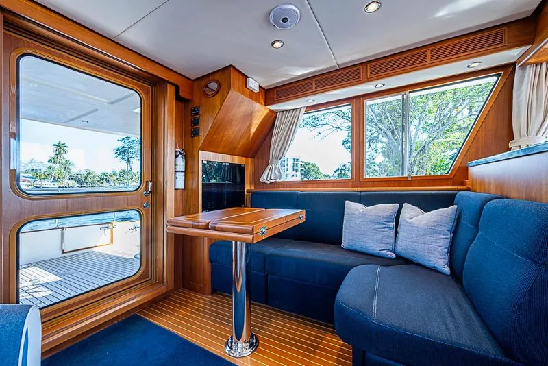 Slide: The Image of Luxurious interior of 2013 Grand Banks 43 Europa yacht with elegant seating and wooden finishes. - 29