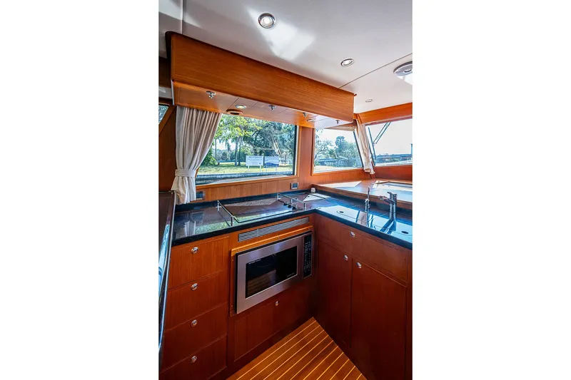 Slide: The Image of Luxurious kitchen interior of 2013 Grand Banks 43 Europa yacht with modern appliances. - 37