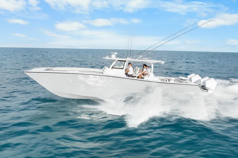 Slide: The Image of High-speed Freeman 47 boat cruising on open ocean, 2099 model. - 11