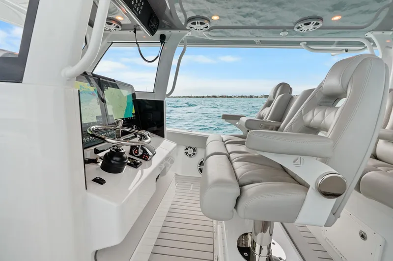 Slide: The Image of Luxurious Freeman 47 boat interior with advanced navigation system, sleek design, and comfortable seating. - 30