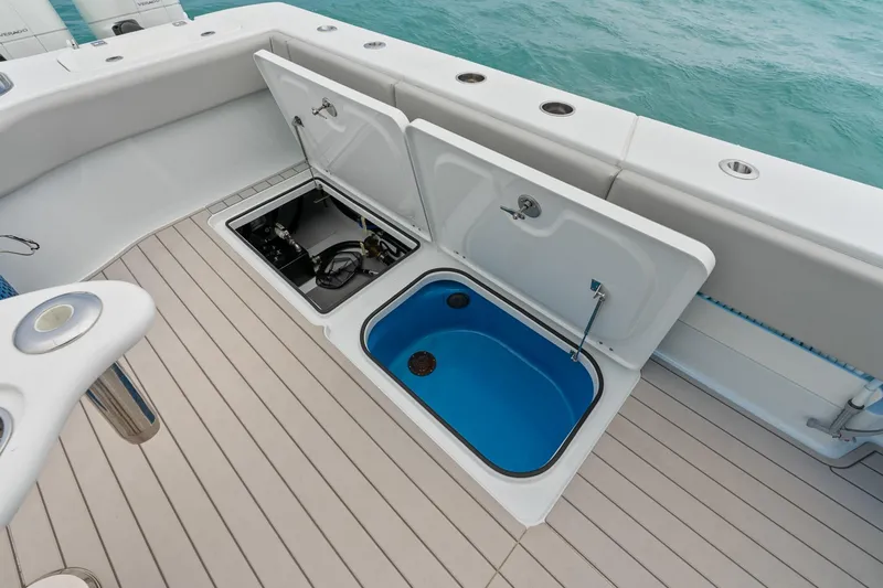 Slide: The Image of Open storage compartments on Freeman 47 boat deck, 2099 model, with ocean view. - 41