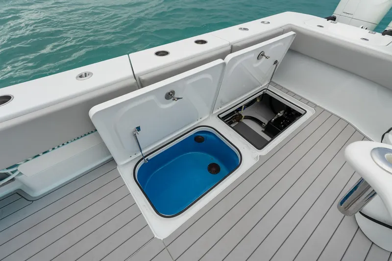 Slide: The Image of Freeman 47 boat deck with open storage compartments, 2099 model. - 43