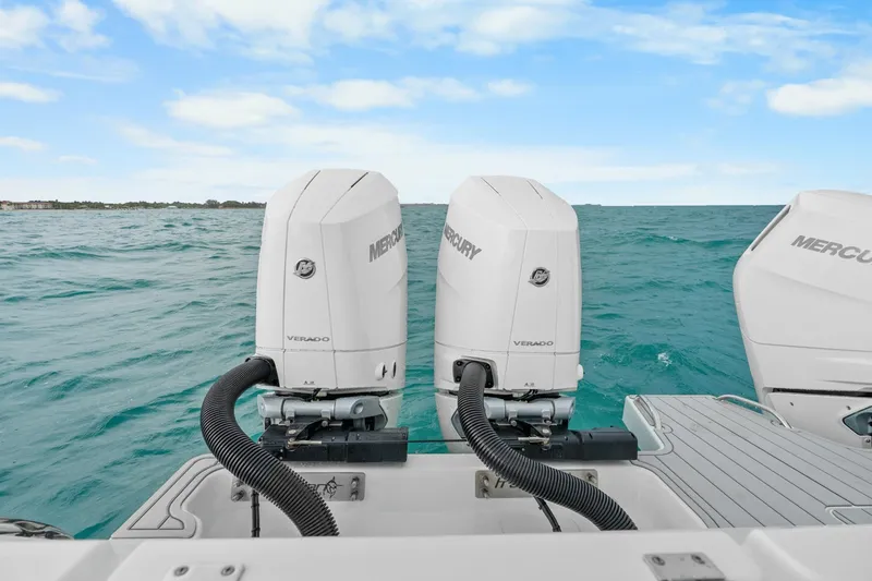 Slide: The Image of Freeman 47 boat with Mercury Verado engines on open sea, 2099 model. - 47