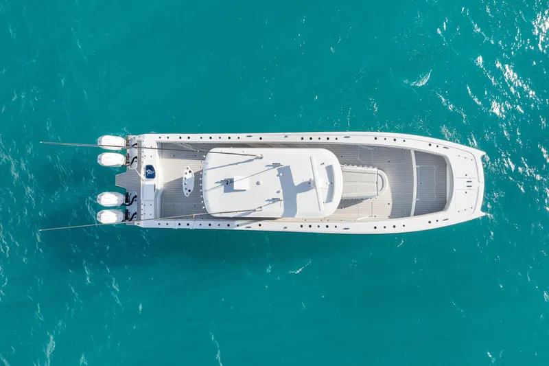 Slide: The Image of Aerial view of Freeman 47 boat, 2099 model, on turquoise water. - 7