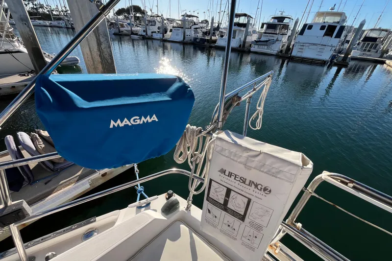 Slide: The Image of Catalina 36 MkII sailboat, 1984, with Magma grill and Lifesling2, docked in marina. - 15