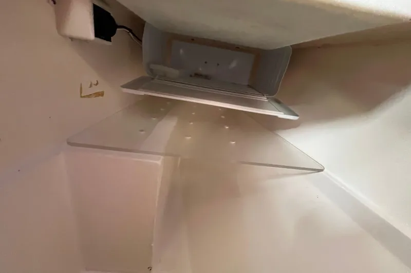 Slide: The Image of Interior view of a 1984 Catalina 36 MkII sailboat refrigerator compartment. - 27