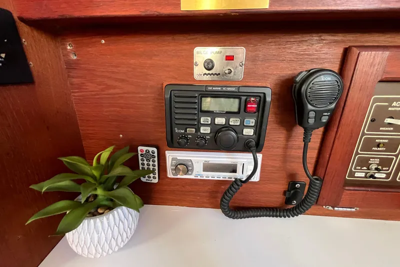 Slide: The Image of Control panel of a 1984 Catalina 36 MkII sailboat with radio and plant. - 41