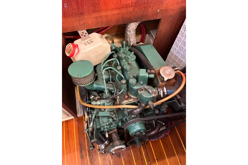 Slide: The Image of Engine of a 1984 Catalina 36 MkII sailboat, showcasing intricate mechanical components. - 43