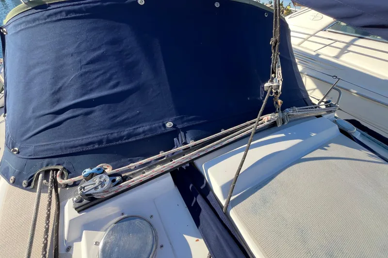 Slide: The Image of Catalina 36 MkII sailboat deck with rigging and blue canvas cover, 1984 model. - 8
