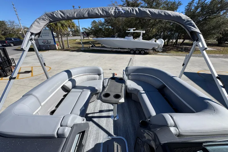 Slide: The Image of 2026 Bennington 23 MFB pontoon boat with spacious seating and modern design. - 19
