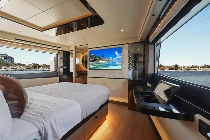 Slide: The Image of Luxurious bedroom interior of 2024 Absolute 60 Fly yacht with waterfront view. - 40