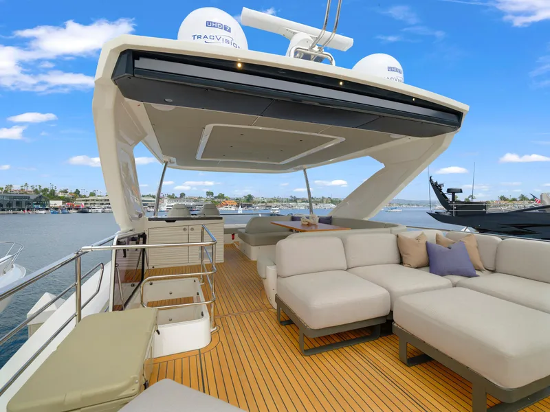 Slide: The Image of Luxurious 2024 Absolute 60 Fly yacht with spacious deck and modern seating. - 23