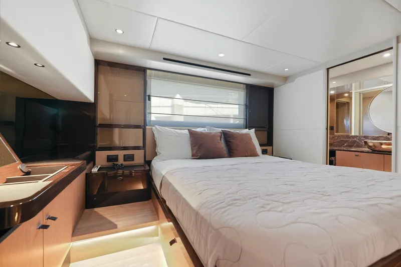 Slide: The Image of Luxurious bedroom interior of the 2024 Absolute 60 Fly yacht. - 45