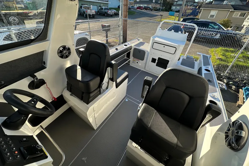 Slide: The Image of Interior of 2026 Sealegs 8.5m Cabin boat with modern seating and controls. - 10