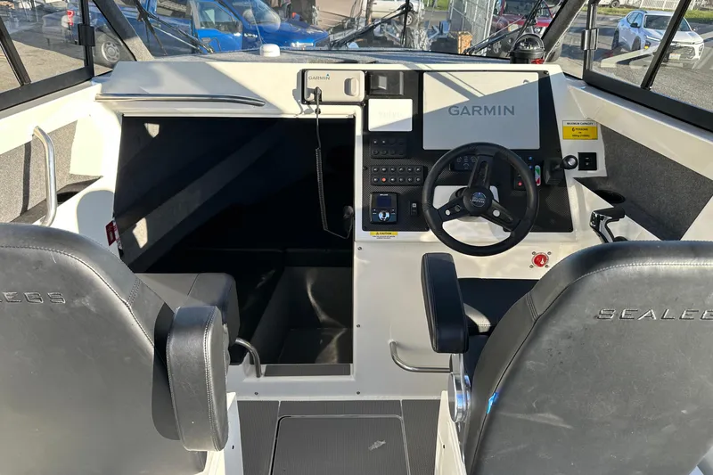 Slide: The Image of Interior of 2026 Sealegs 8.5m Cabin boat with Garmin navigation system. - 12