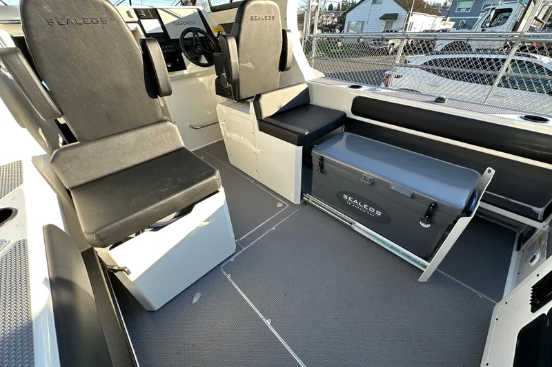 Slide: The Image of Interior of 2026 Sealegs 8.5m Cabin boat with seating and storage. - 15