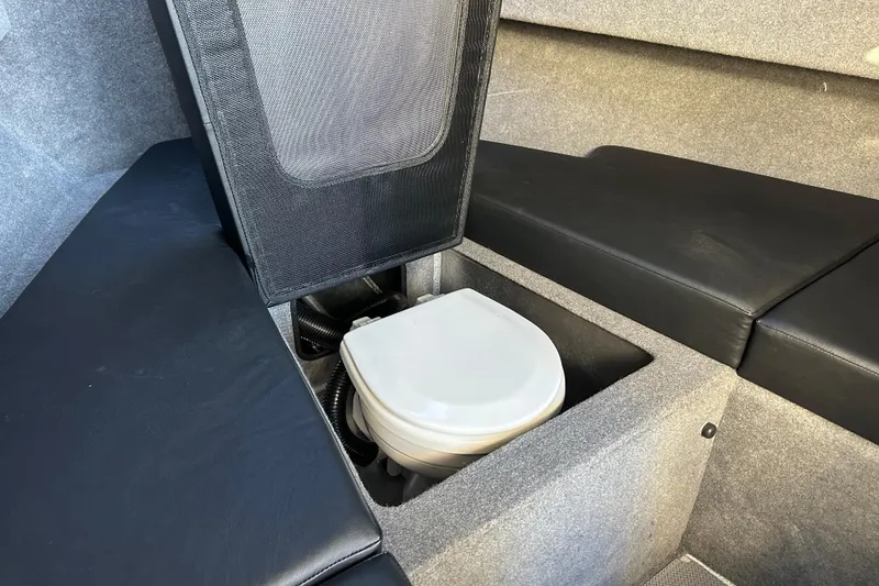 Slide: The Image of Interior of 2026 Sealegs 8.5m Cabin showing compact marine toilet setup. - 20
