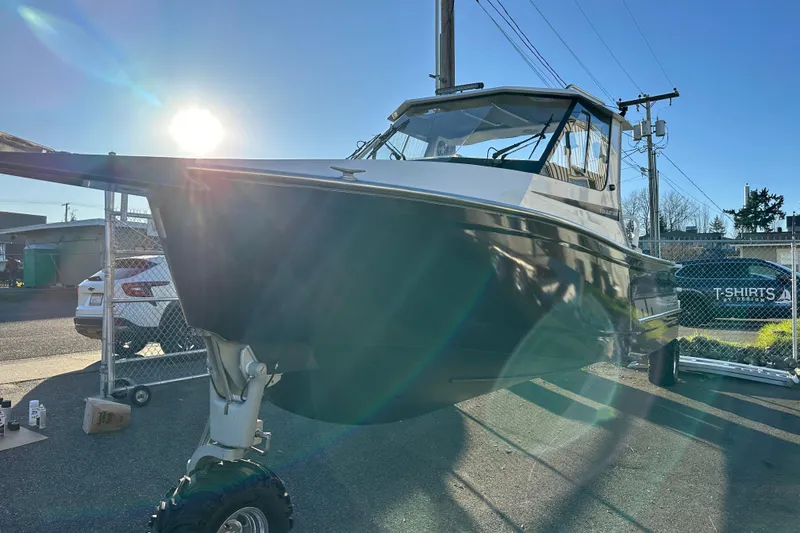 Slide: The Image of 2026 Sealegs 8.5m Cabin boat with wheels, parked outdoors in sunlight. - 4