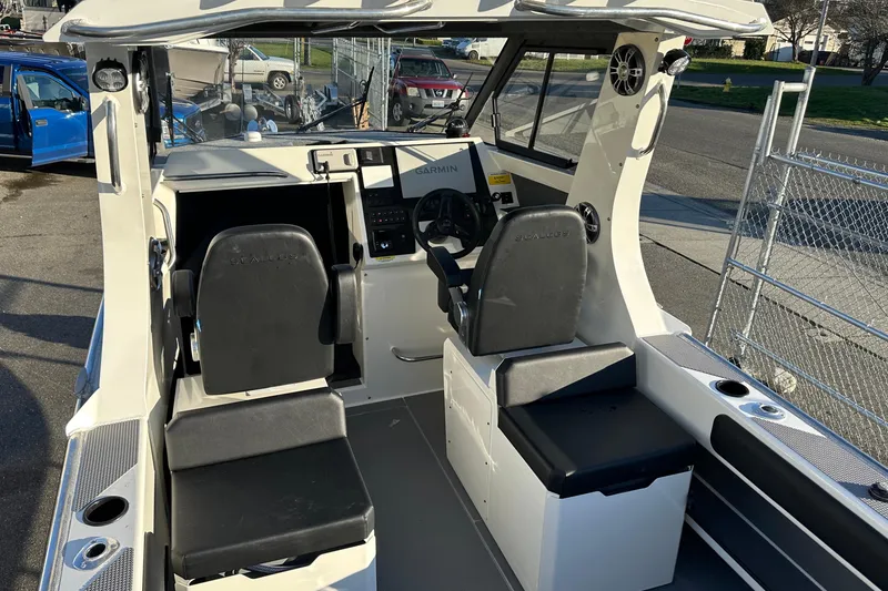 Slide: The Image of 2026 Sealegs 8.5m Cabin boat interior with dual seats and navigation system. - 9