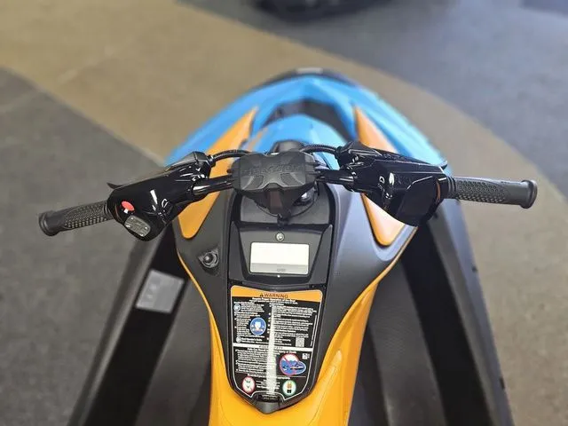 Slide: The Image of Handlebars of 2026 Sea-Doo Spark Trixx, orange and blue. - 15