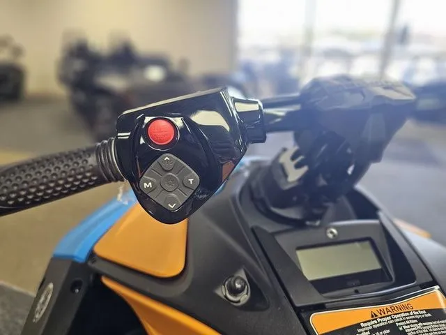 Slide: The Image of Handlebar of 2026 Sea-Doo Spark Trixx with control buttons. - 16