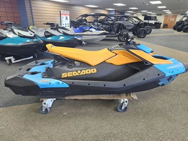 Slide: The Image of 2026 Sea-Doo Spark Trixx for 3 in showroom. - 9