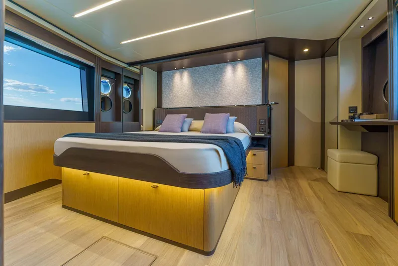Slide: The Image of Luxurious bedroom interior of 2026 Absolute 52 FLY yacht with modern design and ambient lighting. - 41