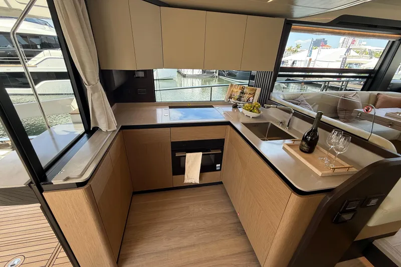 Slide: The Image of Modern kitchen on the Absolute 52 FLY yacht, model year 2026. - 45