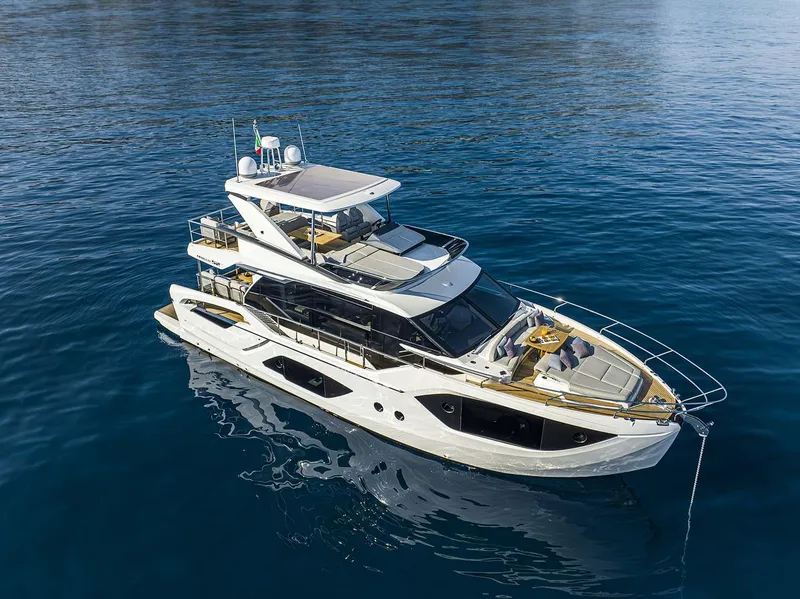 The Image of Luxury Absolute 52 FLY yacht, 2026 model, cruising on calm blue waters. - 0
